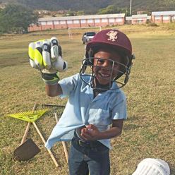 Little boy in cricket gear
