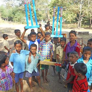 Group of little boys preparing a cricket match