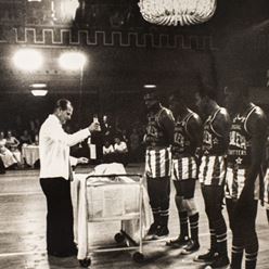 Our Patron and Twelfth Man serves the drinks to the Globetrotters.jpg